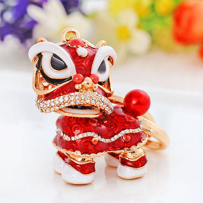 Chinese cute lion dance alloy keychain rotating lion dance car ornaments