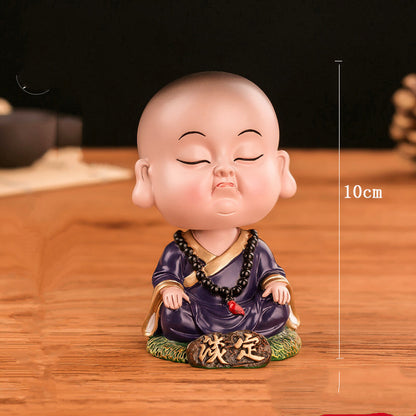 Chinese cultural and creative style Tesla car ornaments Zenmiao shaking head car decoration