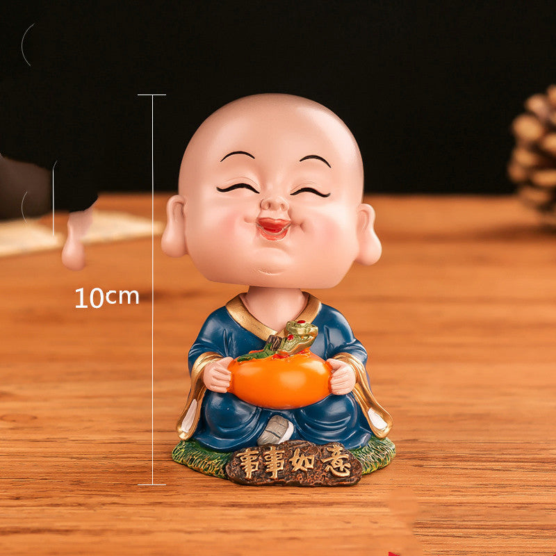 Chinese cultural and creative style Tesla car ornaments Zenmiao shaking head car decoration