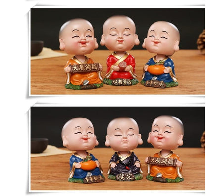 Chinese cultural and creative style Tesla car ornaments Zenmiao shaking head car decoration