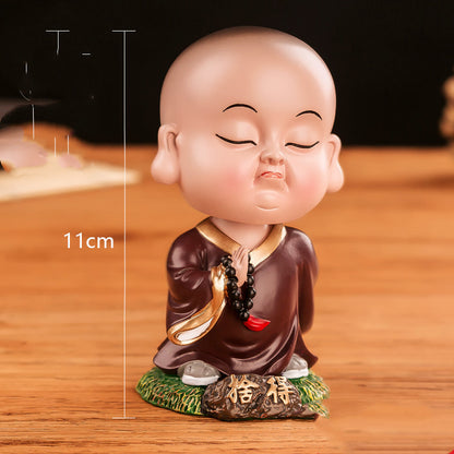 Chinese cultural and creative style Tesla car ornaments Zenmiao shaking head car decoration