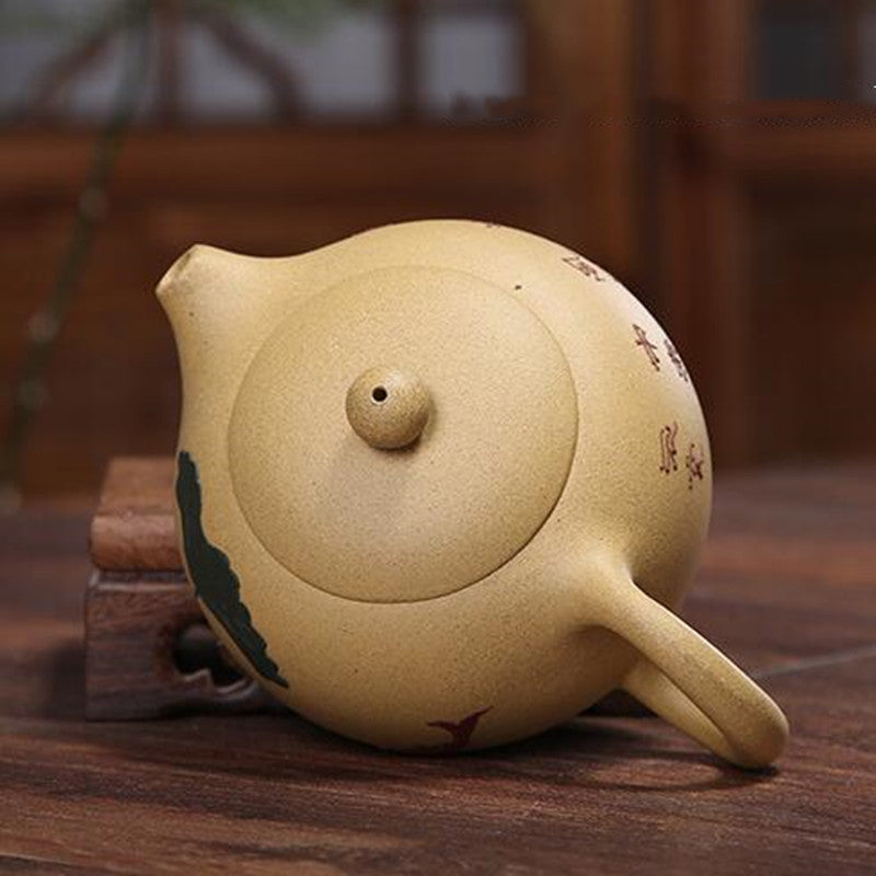 Hand-painted clay hole teapot