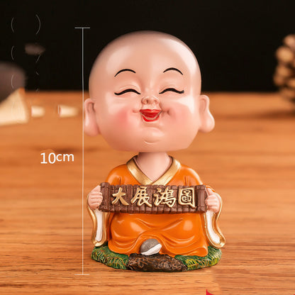 Chinese cultural and creative style Tesla car ornaments Zenmiao shaking head car decoration