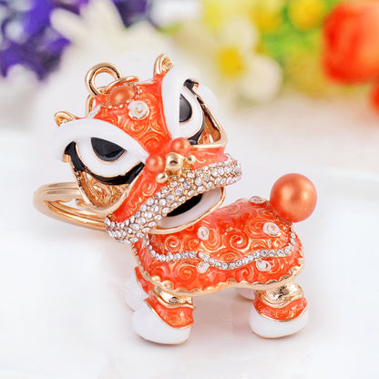 Chinese cute lion dance alloy keychain rotating lion dance car ornaments