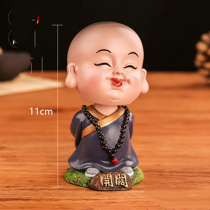 Chinese cultural and creative style Tesla car ornaments Zenmiao shaking head car decoration