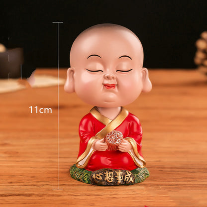 Chinese cultural and creative style Tesla car ornaments Zenmiao shaking head car decoration