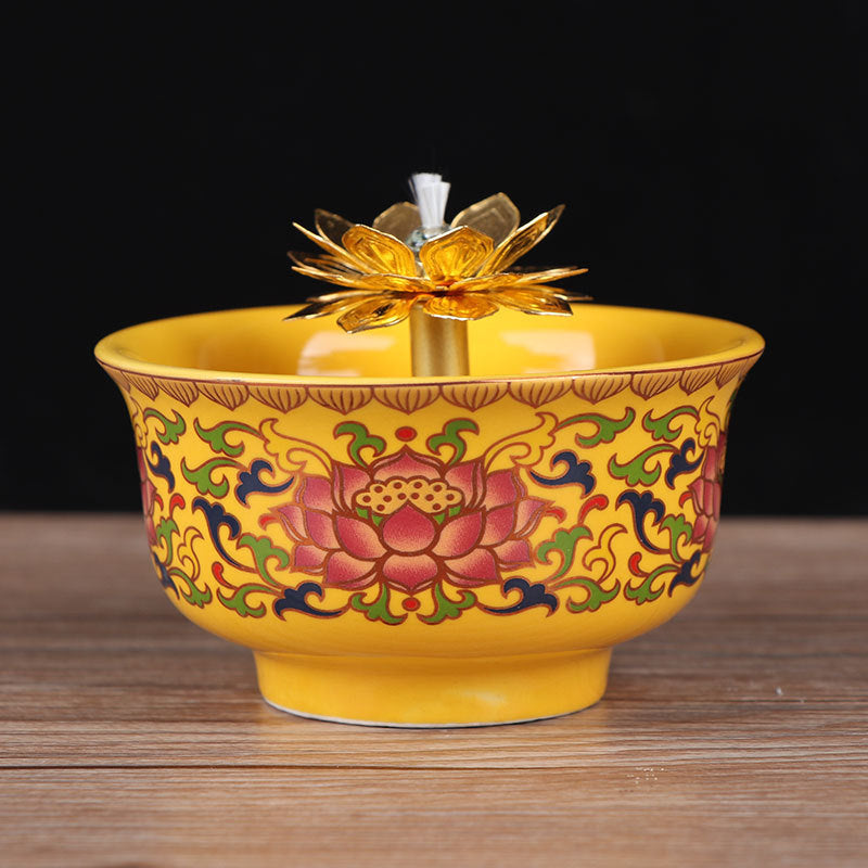 Ceramic Oil Lamp for Home Use in front of Buddha