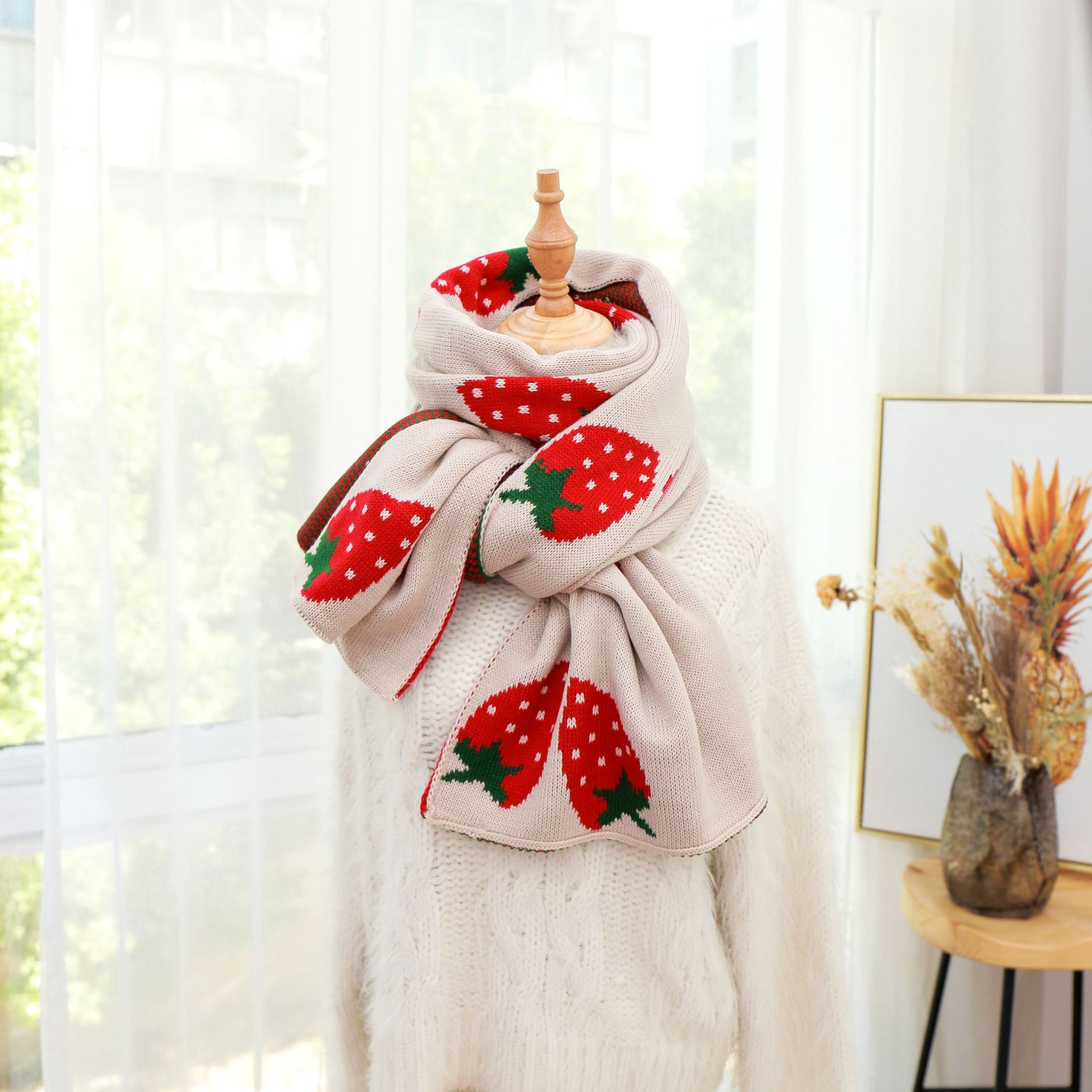 Long strawberry knitted scarf