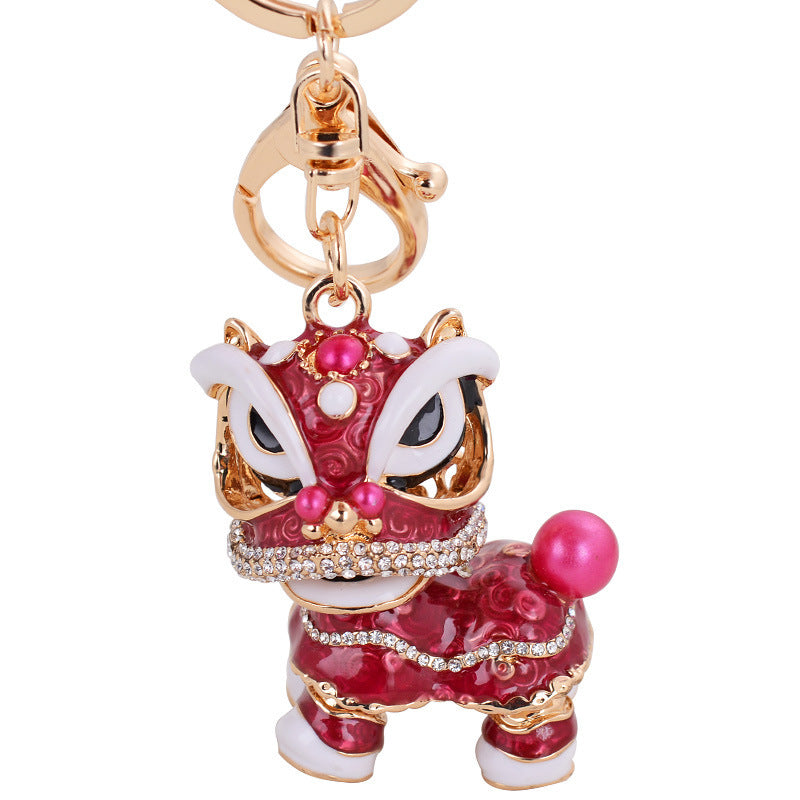 Chinese cute lion dance alloy keychain rotating lion dance car ornaments