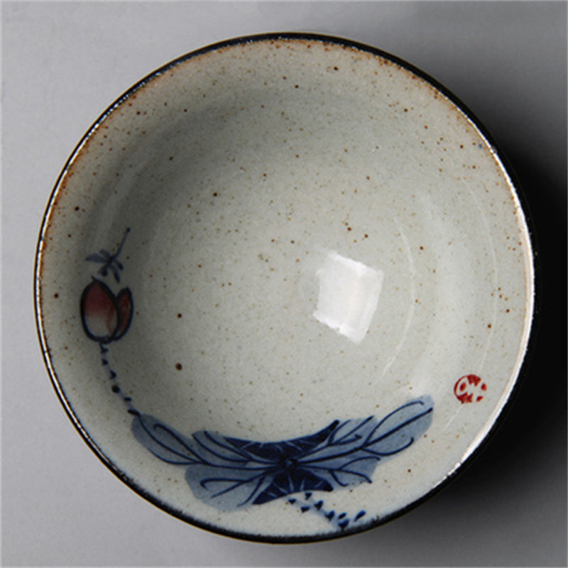 Antique ceramic teacup with hand-painted Kung Fu style