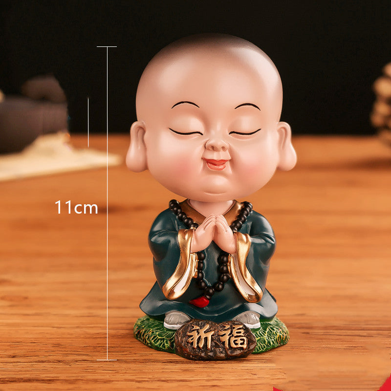 Chinese cultural and creative style Tesla car ornaments Zenmiao shaking head car decoration