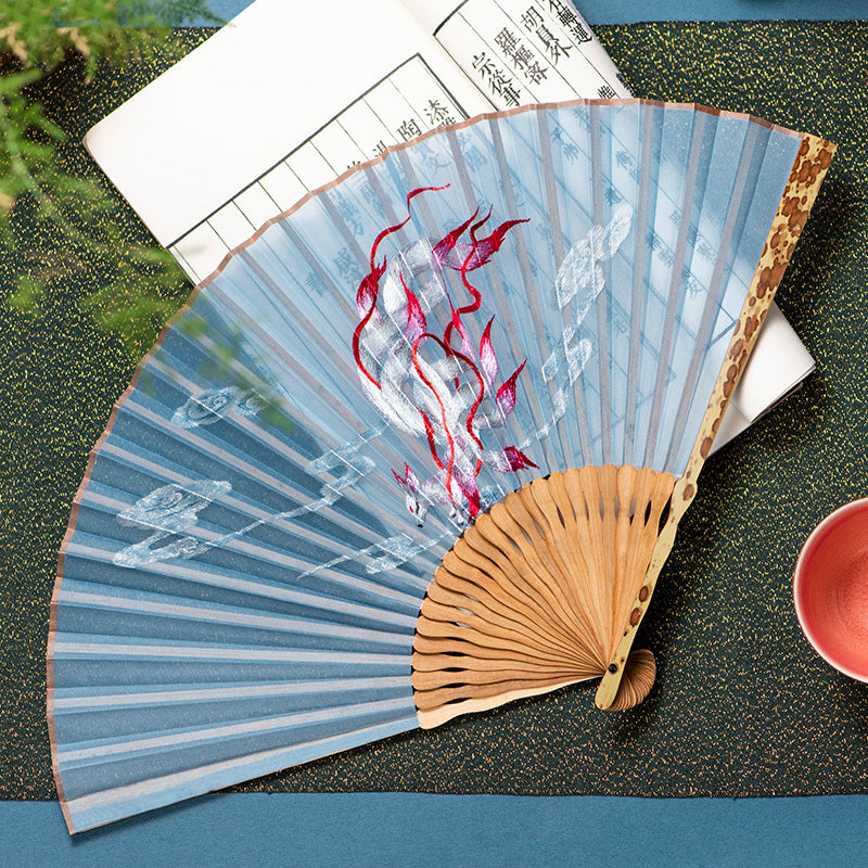 Silk folding fan with bamboo ribs and floral embroidery
