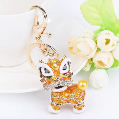 Chinese cute lion dance alloy keychain rotating lion dance car ornaments