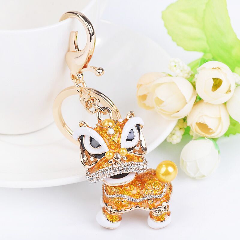 Chinese cute lion dance alloy keychain rotating lion dance car ornaments